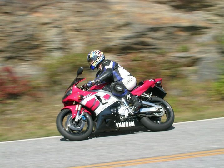 [Vicki and Big Red storming down N.C. Hwy 215 just south of the Blue 
Ridge Parkway</IMG>